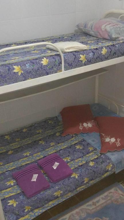 Quarto Triplo com Banheiro Privativo